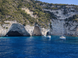boats allegria,exclusive yacht vacations,Blue Caves,Paxos, Ionian sea,sea caves,coastal cliffs, turquoise waters, crystal clear sea,inflatable boat, rib boat,boat trip,hidden spot, rocky cliffs,attractions,allegria,canvas by mitsis messonghi, messonghi,moraitika